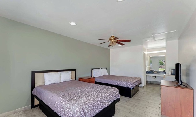 Eastside Promise Neighborhood Hotel | Comfortable Room w/Complimentary Breakfast - Perfect for a Restful Stay