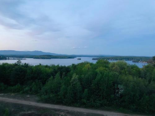 Weirs Beach Apartment | Concerts! Lake Winni Views! Kitchen! Pool! Hot Tub!