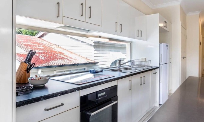 Ashgrove Apartment | Contemporary 2BR Escape: Upper-Level Sanctuary