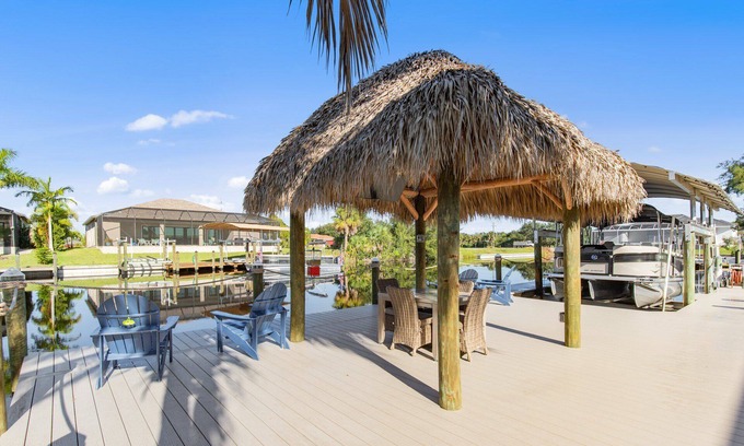 Burnt Store House | Coral Paradise - 4/2 Gulf Access Home with Electric Heated Pool, Game Room, Kayaks, Tiki Hut