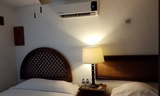 Puerto Juarez Hotel | Corazón de pescador