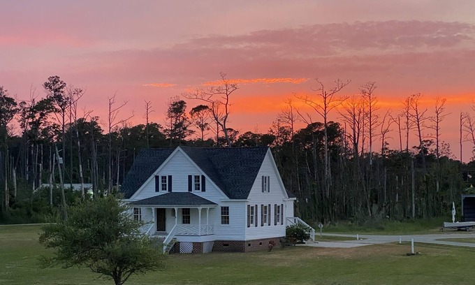 Stacy Cottage | Core Sound Waterfront Cottage with boat ramp and dock on the property.