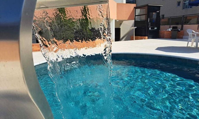 Gonzaga Apartment | Cosmopolitan Praia Flat