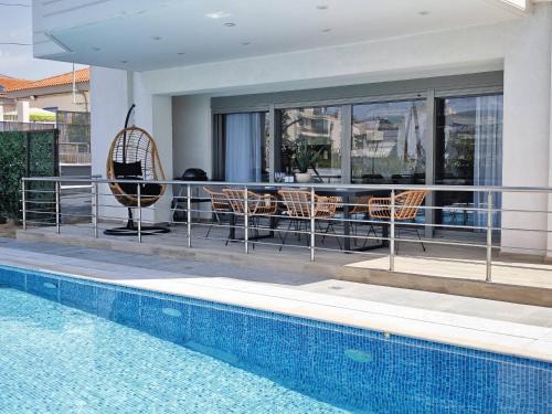 Voula Apartment | Costa Voula Poolside and Beach, Home Cinema