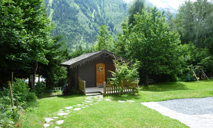 Chamonix City Centre Ski Chalet | Cosy Alpine chalet for two with log fire in peacefull gardens.