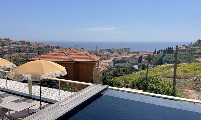 San Lorenzo al Mare Apartment | Cosy apartment for 4 people with A/C, WIFI, pool, TV, patio and parking