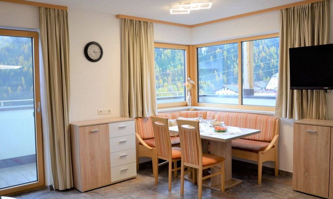 Sankt Anton am Arlberg Villa | Cosy apartment in villa for 3 guests with WIFI, TV, balcony, pets allowed and panoramic view