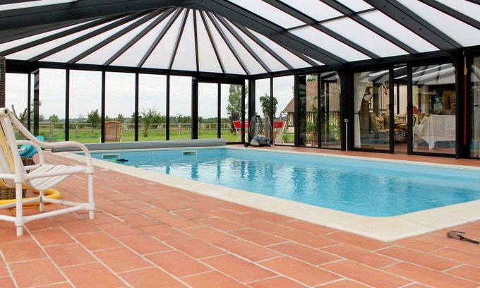Corbon House | Cosy apartment in villa for 3 people with pool, WIFI, TV, patio, pets allowed and parking