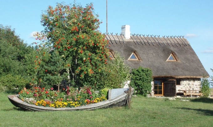 Haeska Cottage | Cosy coast front house with spectacular sea view, fire place and sauna