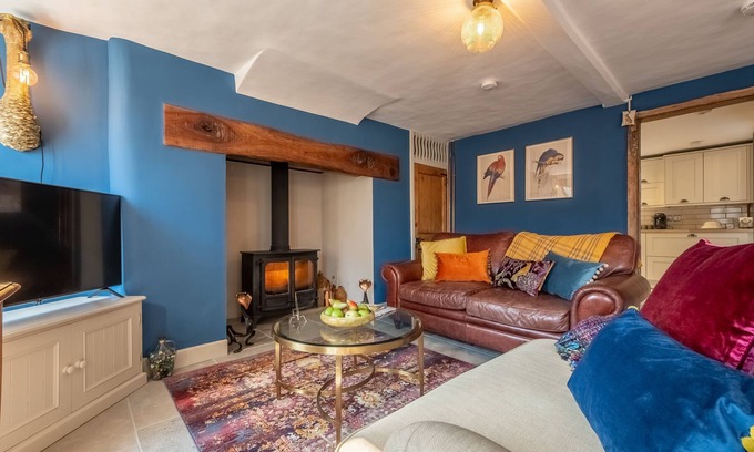 Litcham House | Cosy, comfortable, crammed full of character and presented to charming perfection, Ember Cottage is