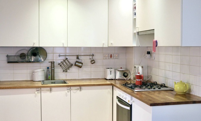 Custom House House | Cosy London home with workspace and garden.