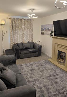 Bolton Apartment | Cosy three bedroom spacious house with parking and Wi-Fi for 7guests