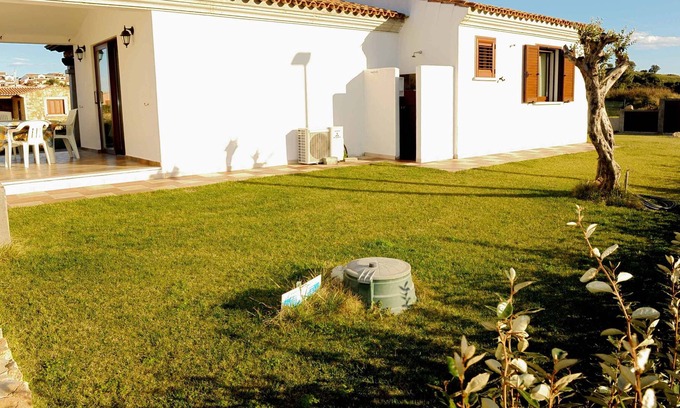 Baia Sant'Anna Apartment | Cottage with beautiful garden, in quiet area