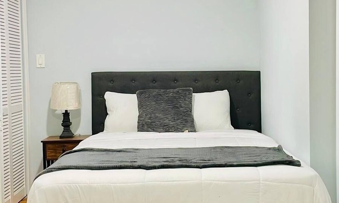 Laurel House | Cozy 1 bedroom patio view shared bathroom living room and kitchen #2