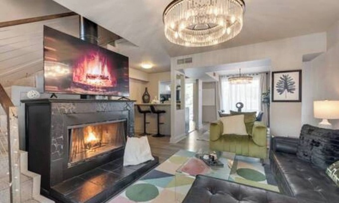 Junius Heights Condo | Cozy 2-story loft with fireplace, luxury linens, full kitchen, and award-winning courtyard.