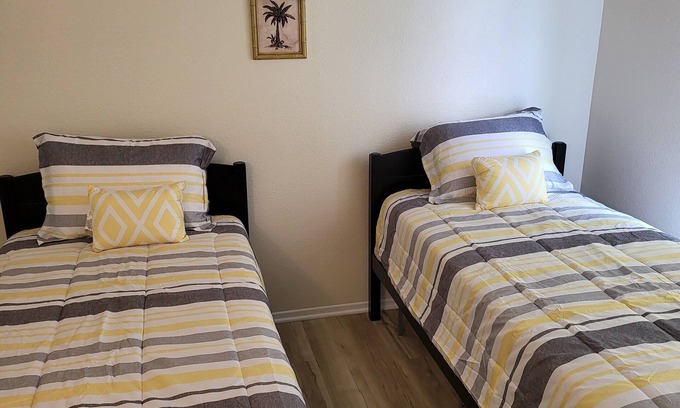 Lancaster House | Cozy 4-bedroom house has WiFi and AC in superb Lancaster, a game room & hot tub.