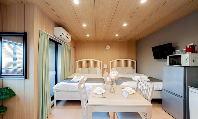 Sonezakishinchi Apartment | Cozy 6 - guest Japanese - themed stay. Great facilities. Private & comfy.