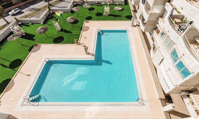 Cabo de las Huertas Apartment | Cozy apartment with swimming pool and balcony, in the best area of Alicante