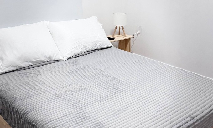 West New York Apartment | Cozy bedroom with attached bathroom 15 ms Manhattan.