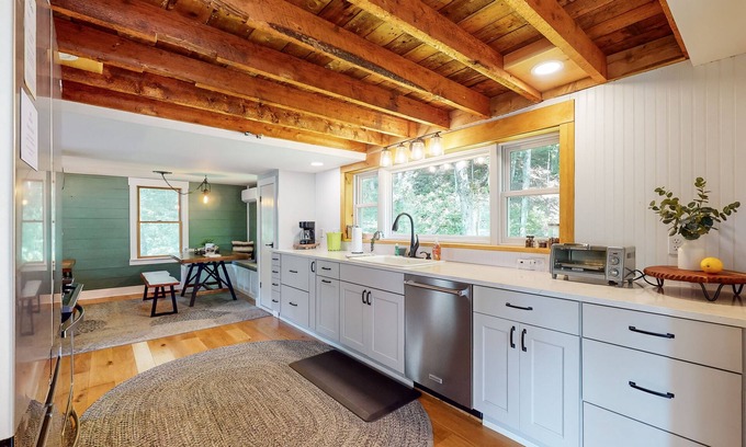 Waterville House | Cozy cabin w/mountain view, brook, dog-friendly, firepit, deck, wifi, TVs, BBQ