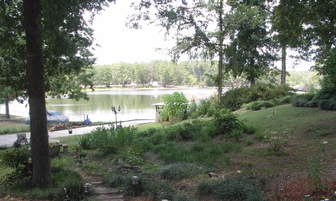 Prosperity Cottage | Cozy Cottage Nestled in the Woods with 225’ of Waterfront on Lake Murray