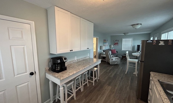 Surf City Cottage | Cozy Cottage steps from the beach small pet friendly