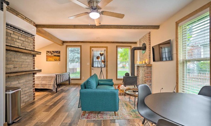 Dayton Apartment | Cozy Dayton Cottage with Yard Walk to Main Street!