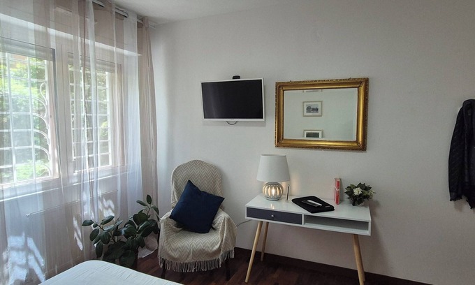 Zona XXVIII Tor de' Cenci Apartment | Cozy family apartment with free covered parking close to EUR business area.