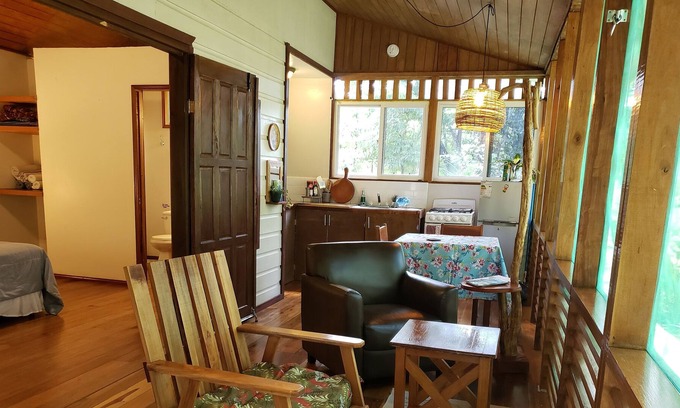 San Ignacio Cabin | Cozy Forest Screened Cabin- 2 beds, AC, firepit patio -7 min to downtown