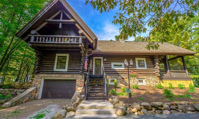 Spooner Cabin | Cozy Lake front luxury, hot tub, ice fish, snowmobile, fireplace, screened porch