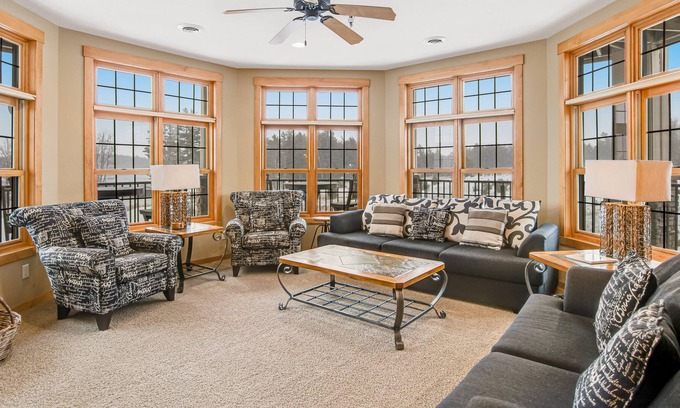 Three Lakes Condo | Cozy lakefront condo with balcony, fireplace, AC, indoor pool, gym, & hot tubs