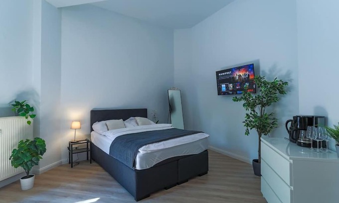Bad Nauheim Apartment | Cozy-Livings Altbau mit Terrasse und Küche am Stadtpark