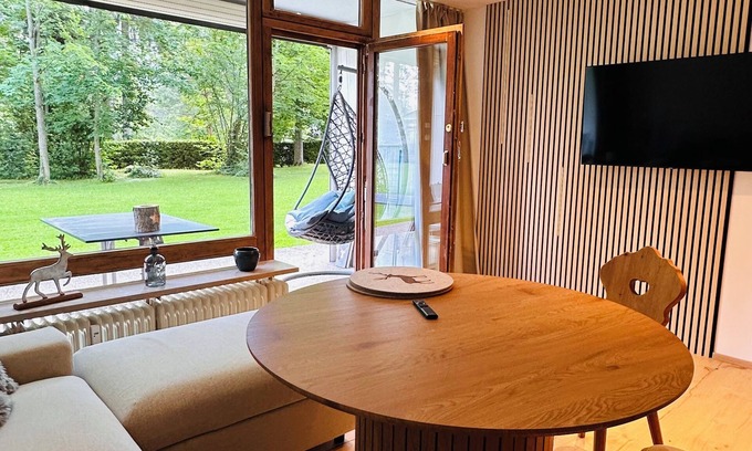 Sankt Martin bei Lofer Apartment | Cozy new vacation apartment with mountain views, garden and swimming pool