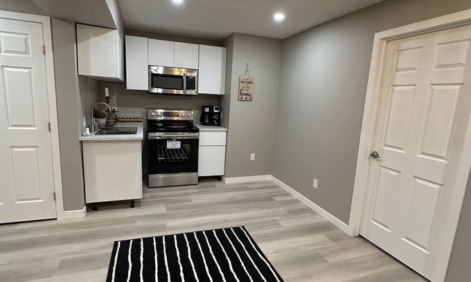 Calgary House | Cozy new private suite, close to the airport. no cleaning fee