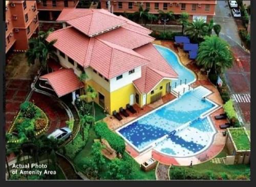 San Dionisio Apartment | Cozy Studio Unit near Manila Airport With Swimming Pool, Full Kitchen 7A