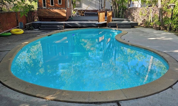 Millcreek Apartment | Cozy Studio with a large deck shaded by trees. Access to the pool and hot tub.