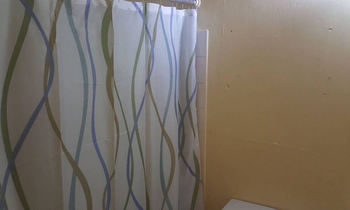 Molynes Gardens House | Cozy town house with two bedrooms that sleeps a maximum of four persons.