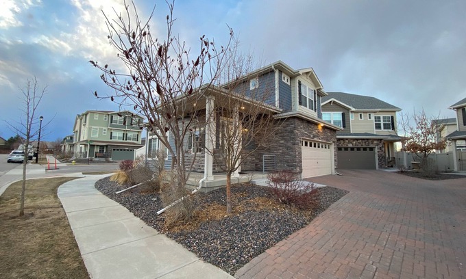 Dupont House | Cozy Two-Story Cottage House in Thornton with Secured Garage Parking.