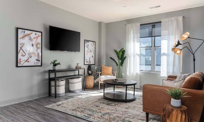 Central Business District Apartment | CozySuites at the Banks gym, pool 03