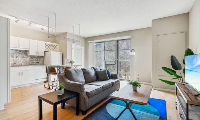 Mill District Apartment | CozySuites Mill District with pool, gym #05