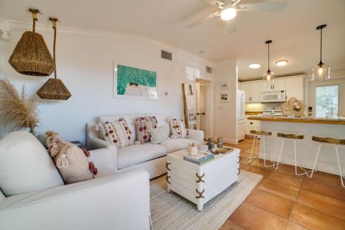 Holmes Beach House | Cozzi Cottage located only steps to the white sandy beaches complete with rooftop terrace