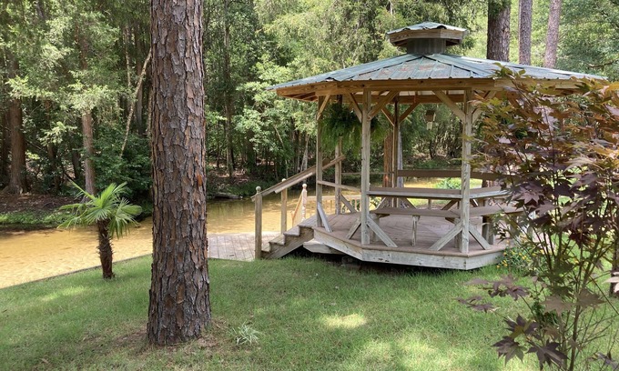 Holt RV Rental | Creek Waterfront Private RV Lot (3 minutes from interstate)
