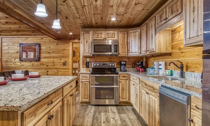 Black Bear Falls Cabin | Cub Path Lodge - Luxurious 5/5 With Theatre Room And Mountain Views! 5 Bedroom Cabin by RedAwning
