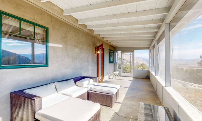 Weldon House | Custom-crafted acreage with sunroom & clawfoot tub
