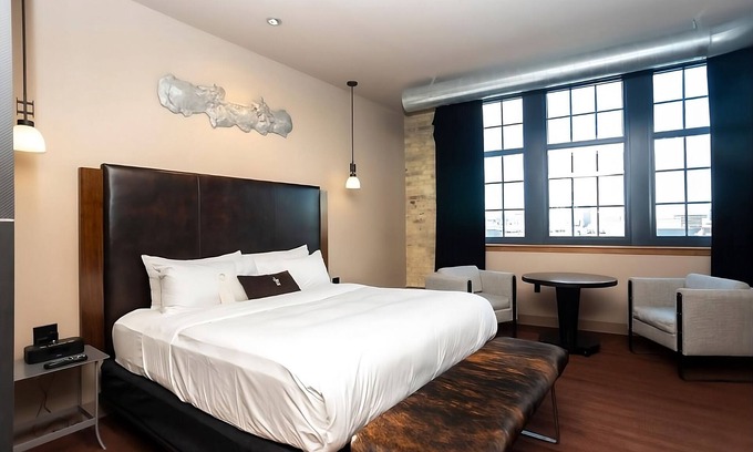 Fifth Ward Hotel | Custom Deluxe King at The Iron Horse Hotel, Short Drive To Erie Street Plaza!