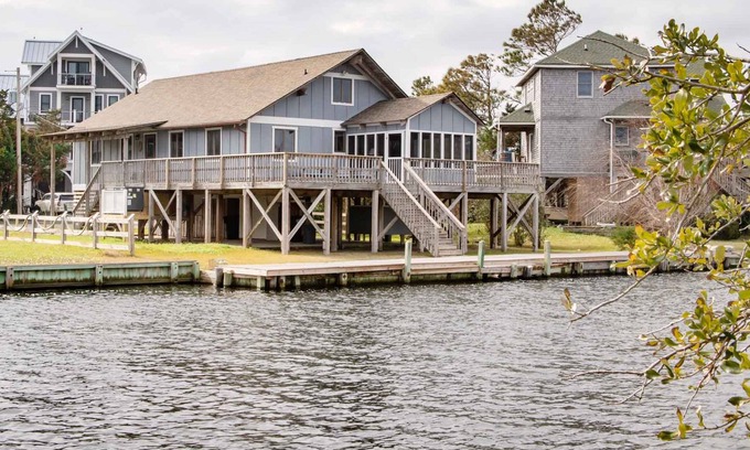 Brigands' Bay House | Cute, canal-front home in quiet area with great deck space, screened porch & AC