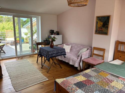 Wismar Apartment | Dachgeschosszimmer mit Terrasse