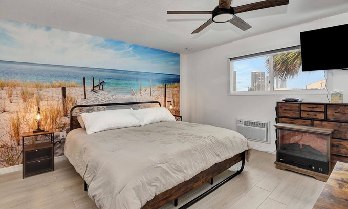 Daytona Beach Shores Hotel | Daytona FL Studio suite King bed kitchen walk in shower #11
