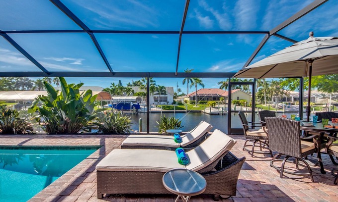 Pelican Villa | Delightful 3 BR waterfront Villa w. heated pool/dock/boat lift/fishing poles