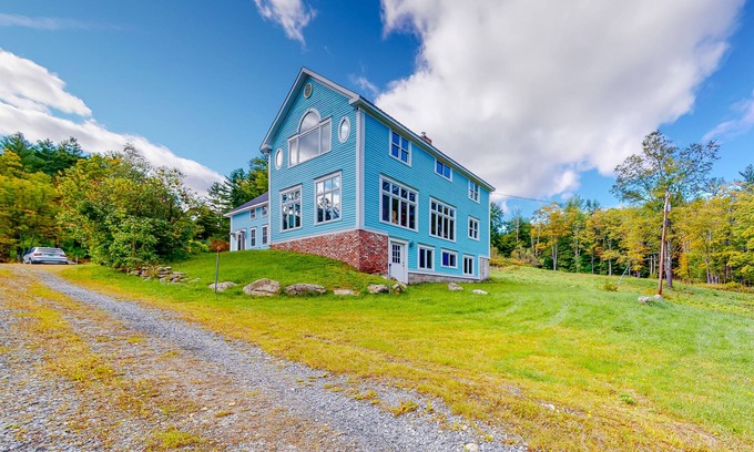 Jamaica House | Delightful updated farmhouse with original features, patio, and & W/D